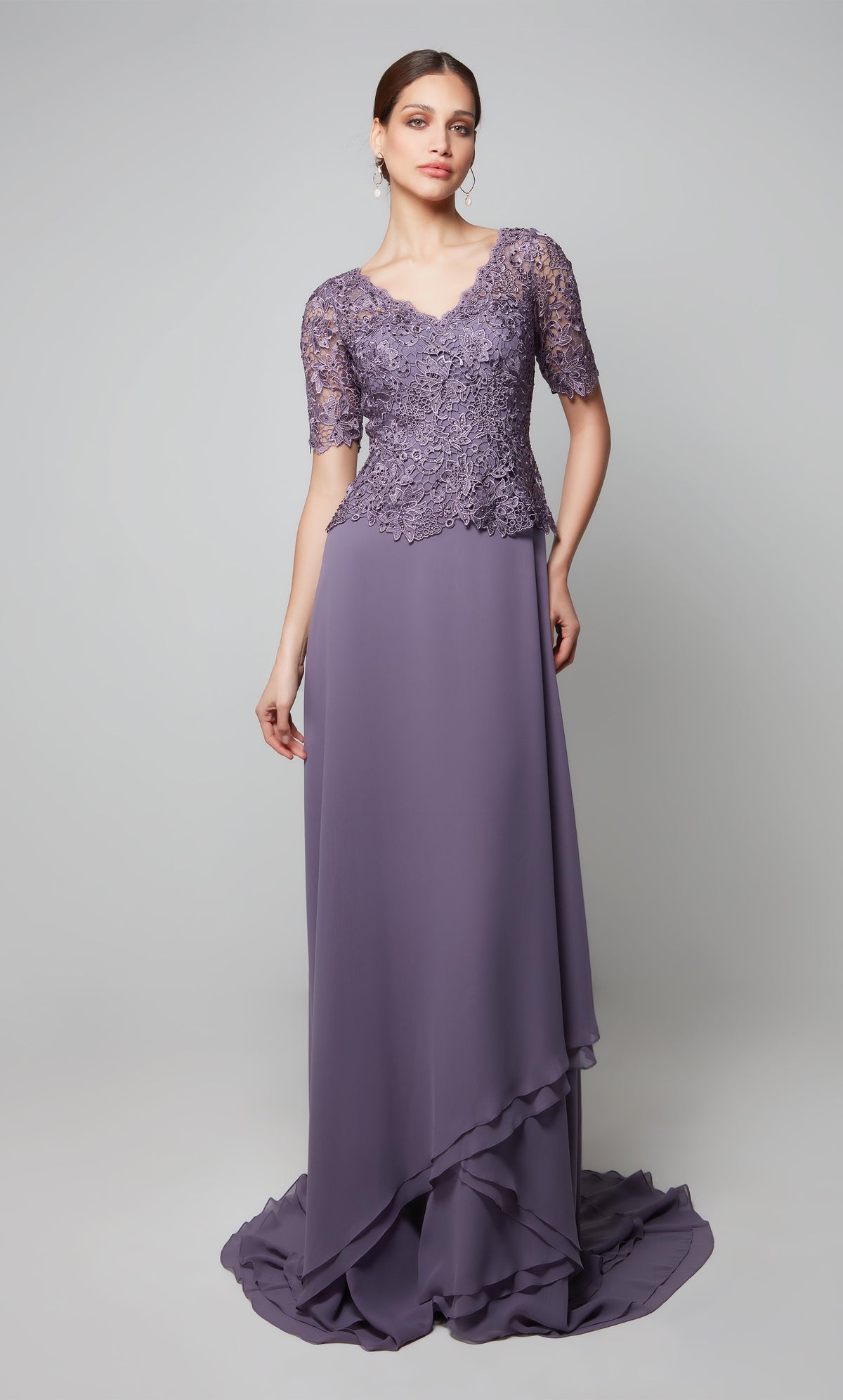 Purple special occasion dress with a lace peplum top with short sleeves and a flowy chiffon skirt.