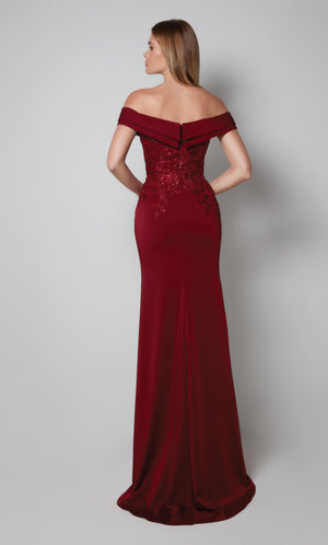 Fit and flare mother of the bride dress with an off the shoulder neckline and train in burgundy.