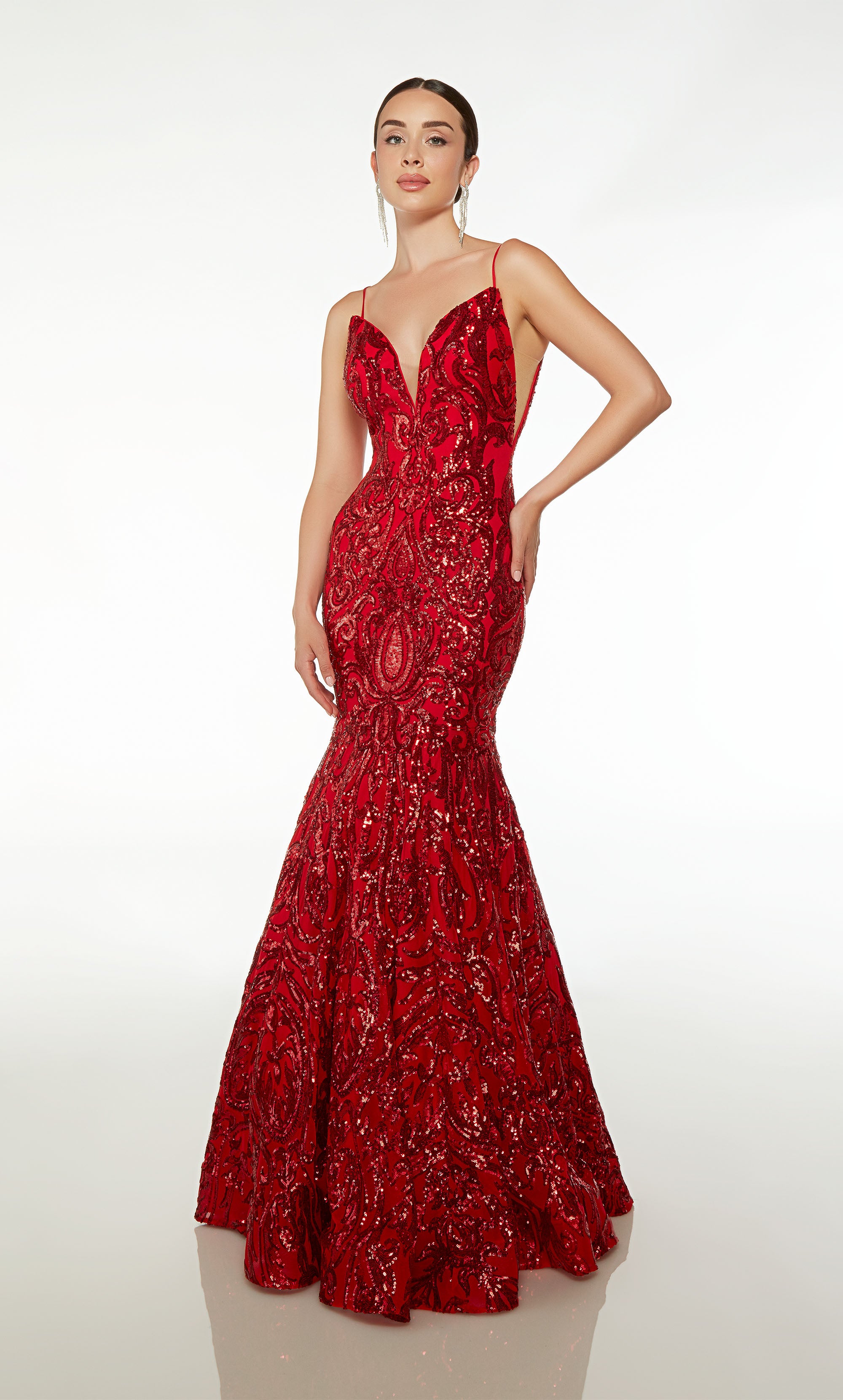 Elegant red sparkly mermaid prom dress: plunging neckline, illusion cutouts, V-shaped open back—an dazzling and sophisticated ensemble.
