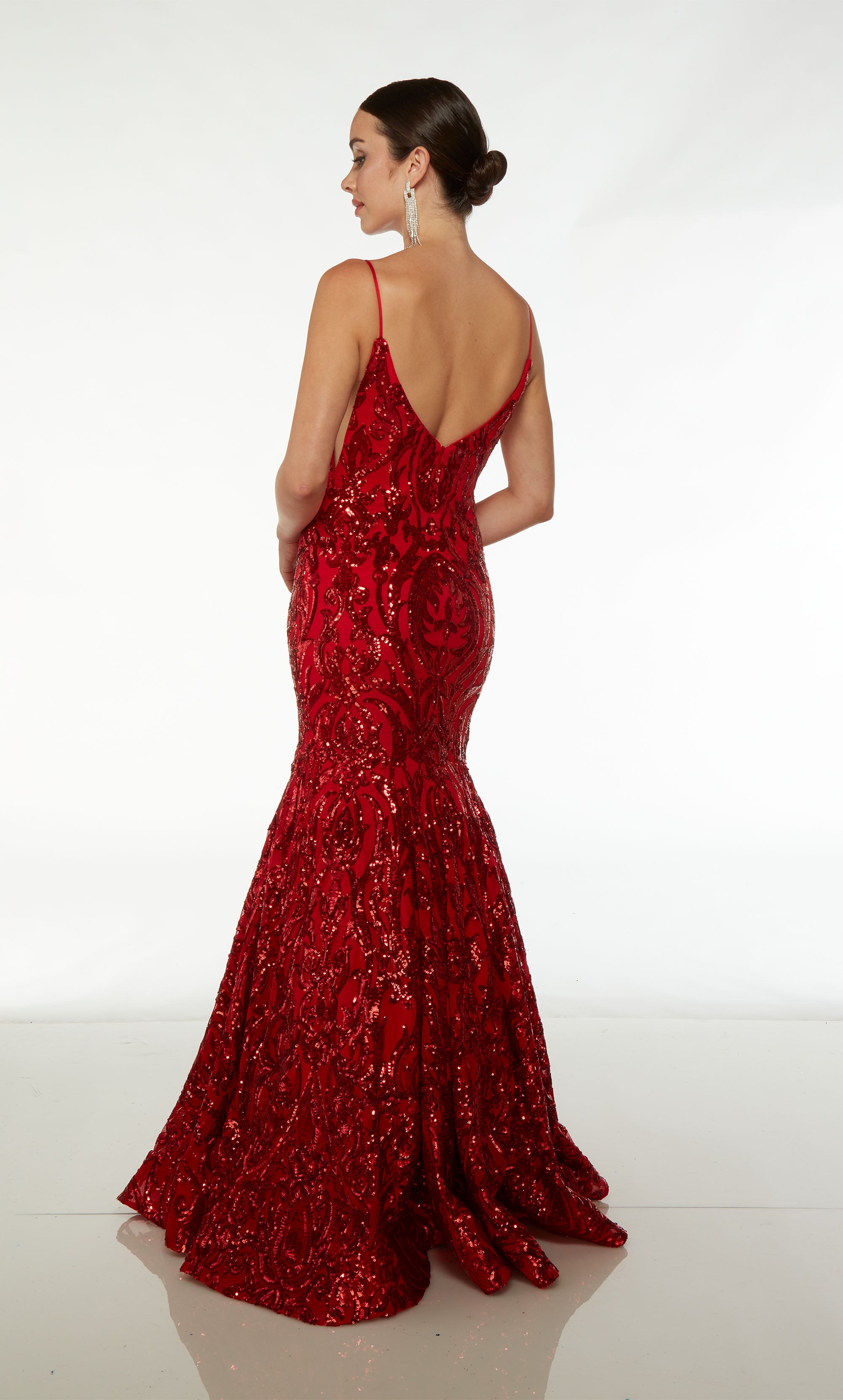 Elegant red sparkly mermaid prom dress: plunging neckline, illusion cutouts, V-shaped open back—an dazzling and sophisticated ensemble.