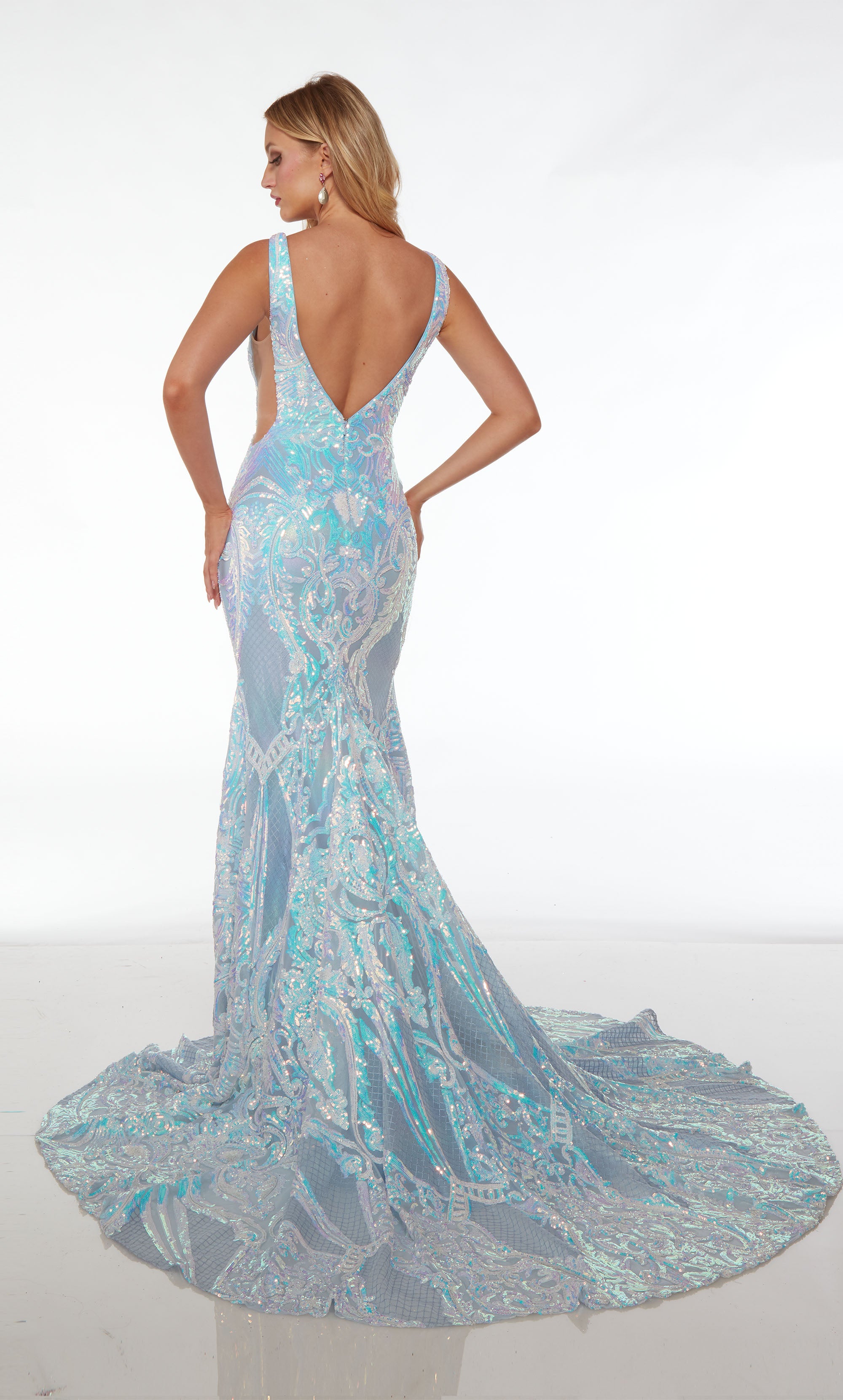 Opulent opal-blue formal dress: plunging neckline, illusion cutouts, paisley-patterned iridescent sequins, V-shaped back, and graceful train.