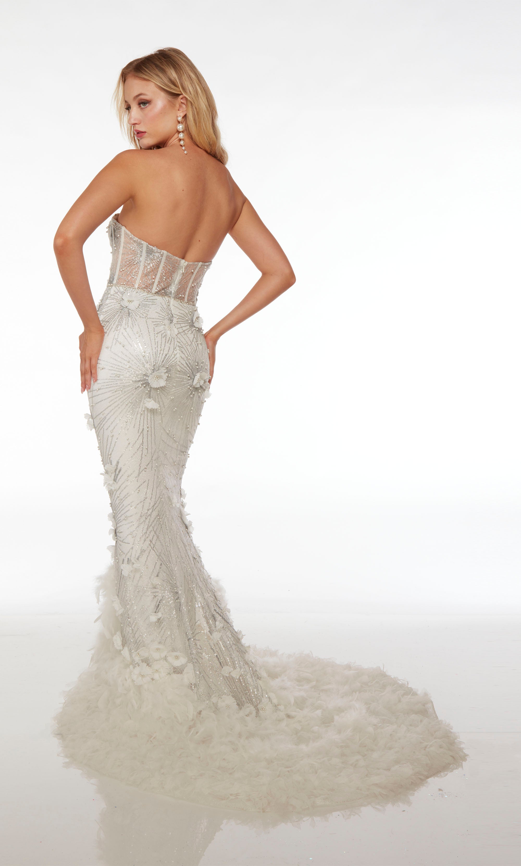 Strapless white-silver formal gown: sweetheart neckline, corset bodice, keyhole detail, mermaid silhouette, adorned with 3D flowers in glitter tulle fabric.