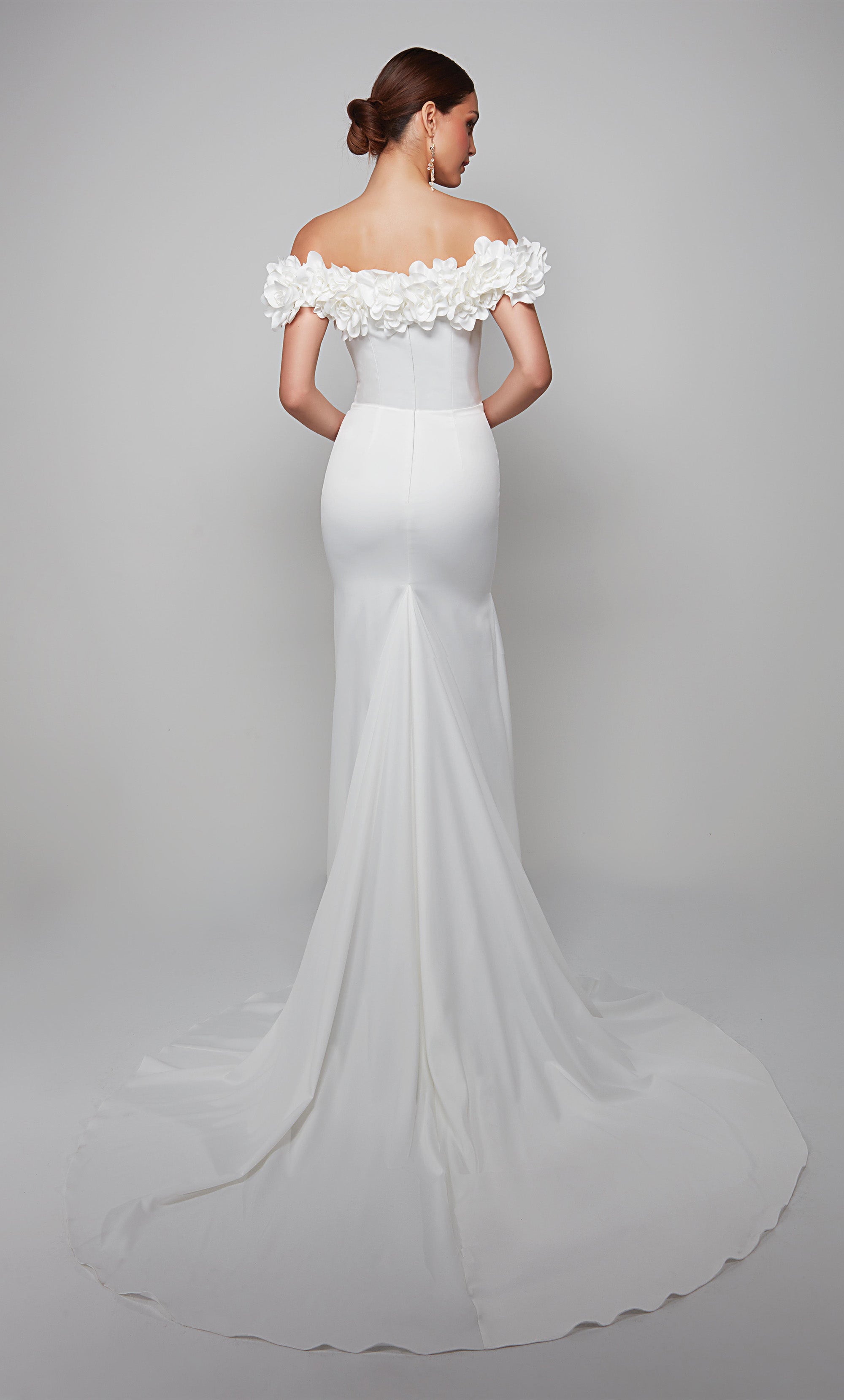 Fit and flare wedding dress featuring an off the shoulder bodice enhanced with a beautiful satin flower voiant. Color-SWATCH_7061__DIAMOND-WHITE