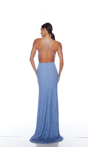 Light blue sequin gown with an V neckline, slit, and crisscross adjustable strap back, and an slight train for an elegant and alluring look.