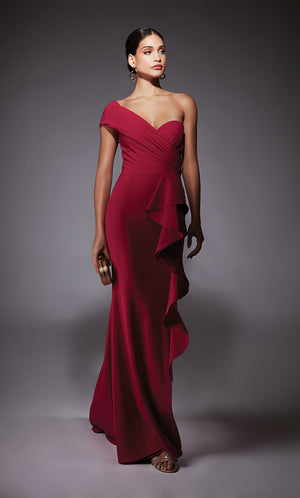 A raspberry pink colored one shoulder evening gown with a cascading ruffle and side slit.
