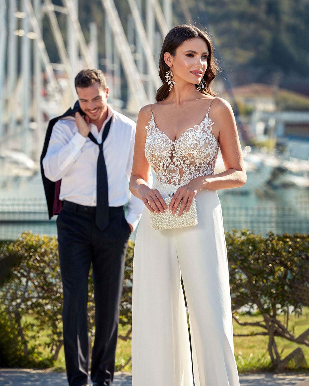 Ivory wedding jumpsuit with lace bodice.