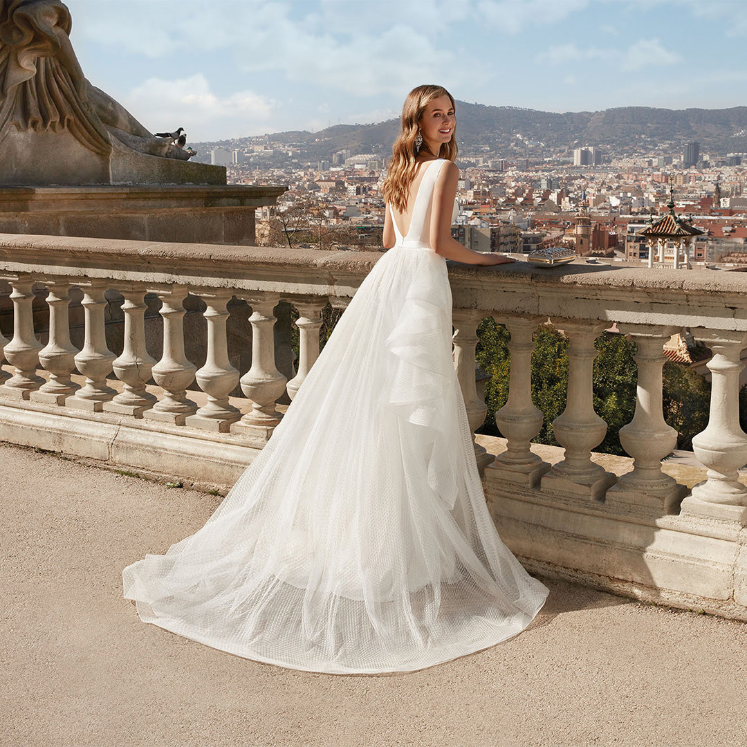 white wedding dress with detachable tulle overskirt
