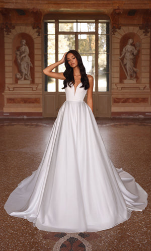 Wedding Dress: 7024. Long Bridal Gown, Plunging Neckline, Flowy