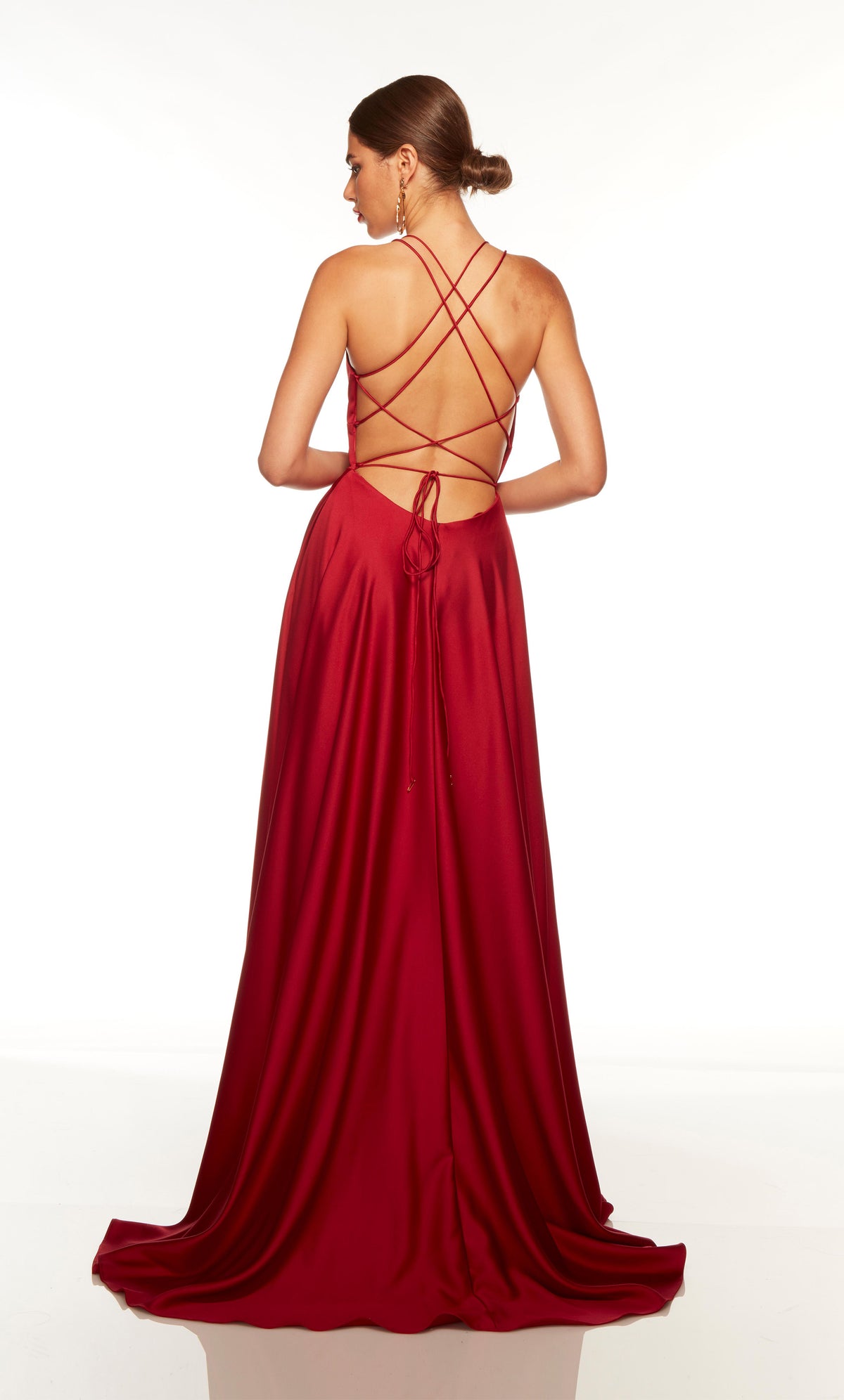 Long formal dress with a strappy back and train in red.