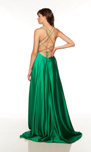 Green formal dress with a strappy back and train.