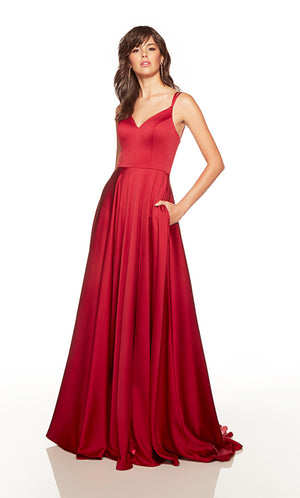 Red prom dress with a sweetheart neckline, pockets, and a side slit.