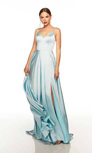 Blue prom dress with a sweetheart neckline, pockets, and a side slit.