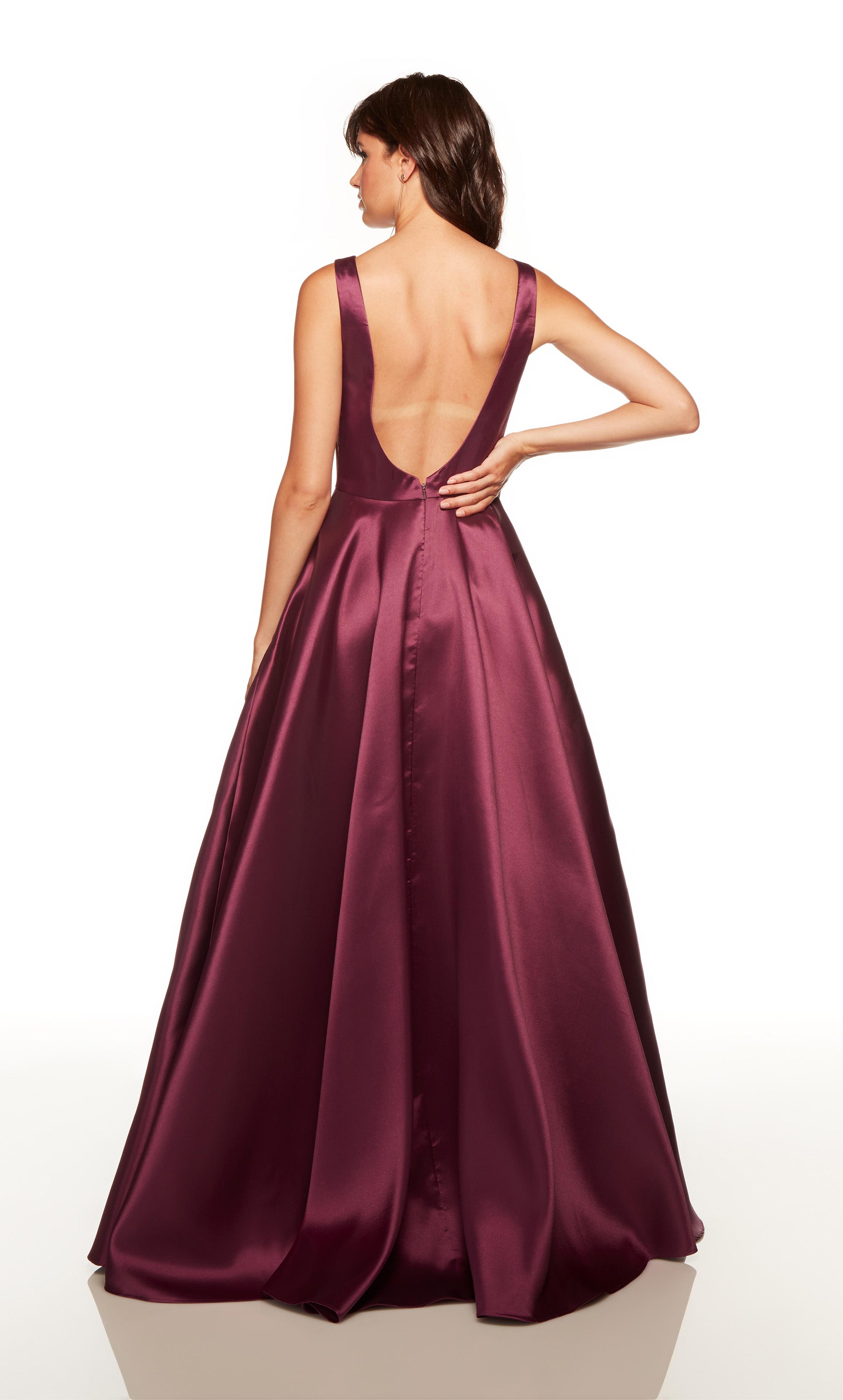 Long prom dress with a plunging neckline and side slit in black plum color. COLOR-SWATCH_1752__BLACK-PLUM