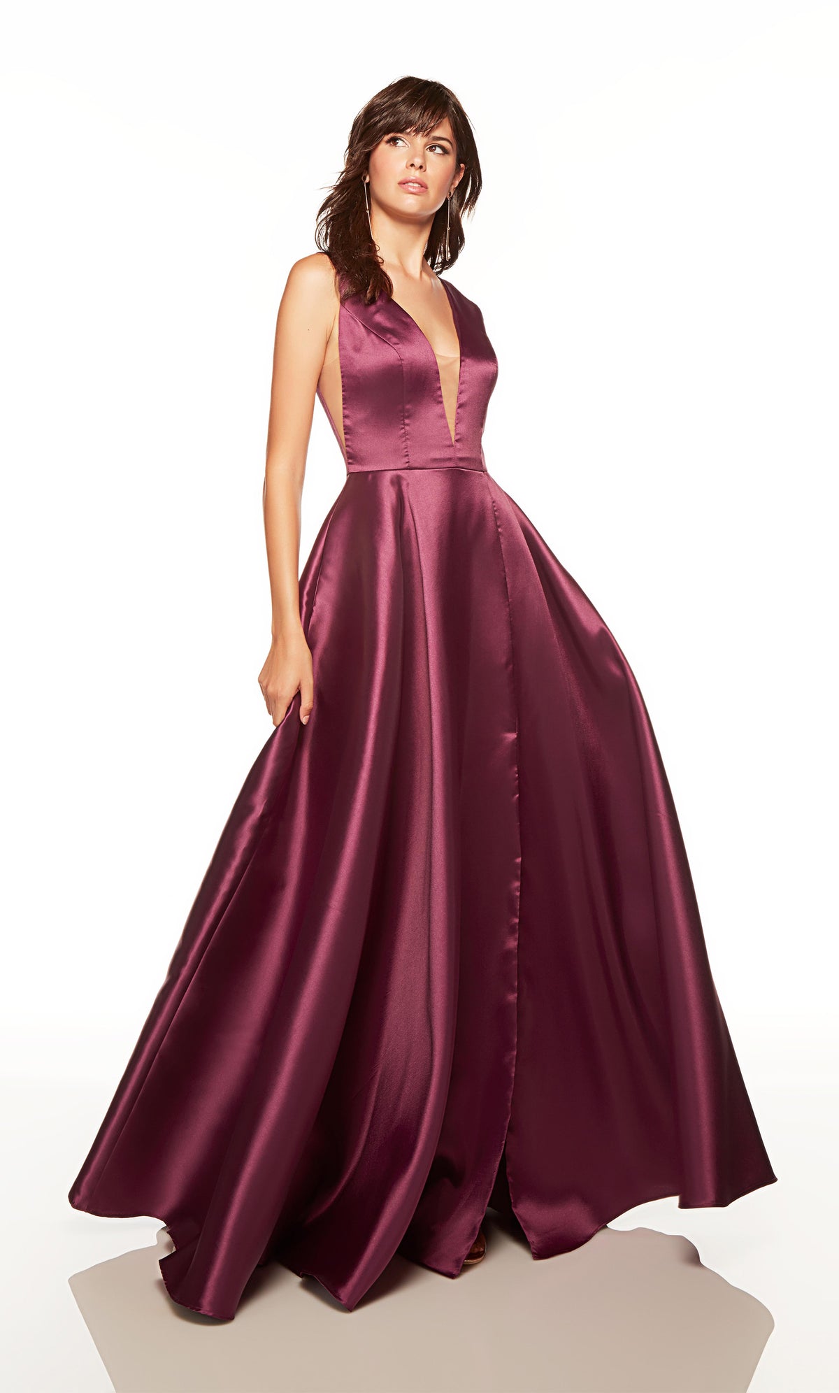 Elegant ballgown with a plunging neckline and side slit in black plum color.