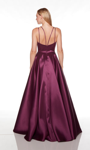 Formal ballgown with a strappy back in the color black plum.