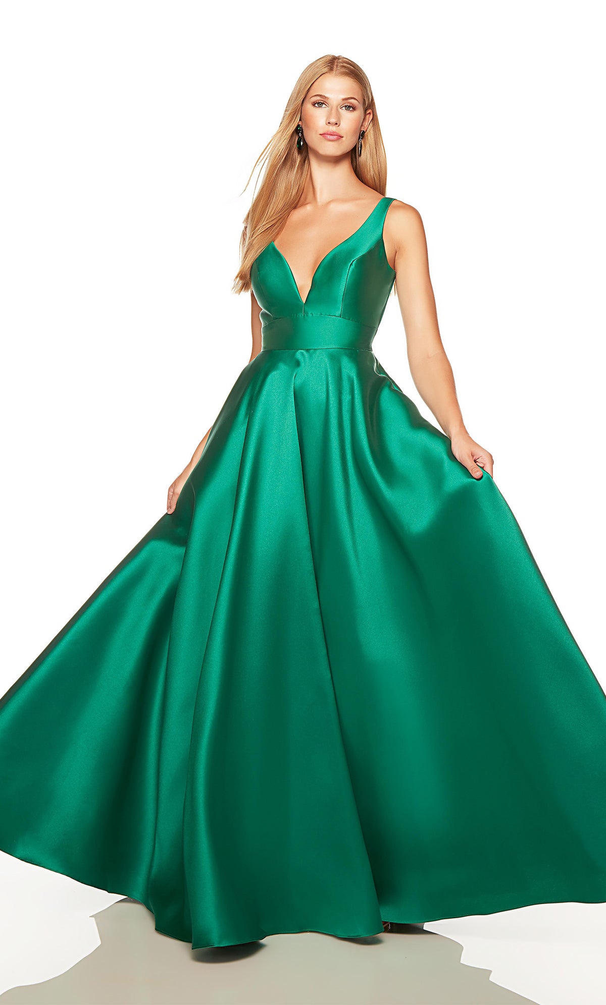 Green ballgown with a plunging neckline and pockets.