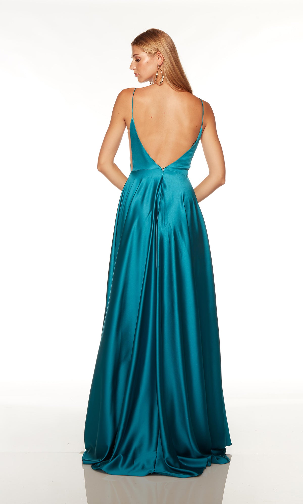 Blue prom dress with a V shaped open back and train.