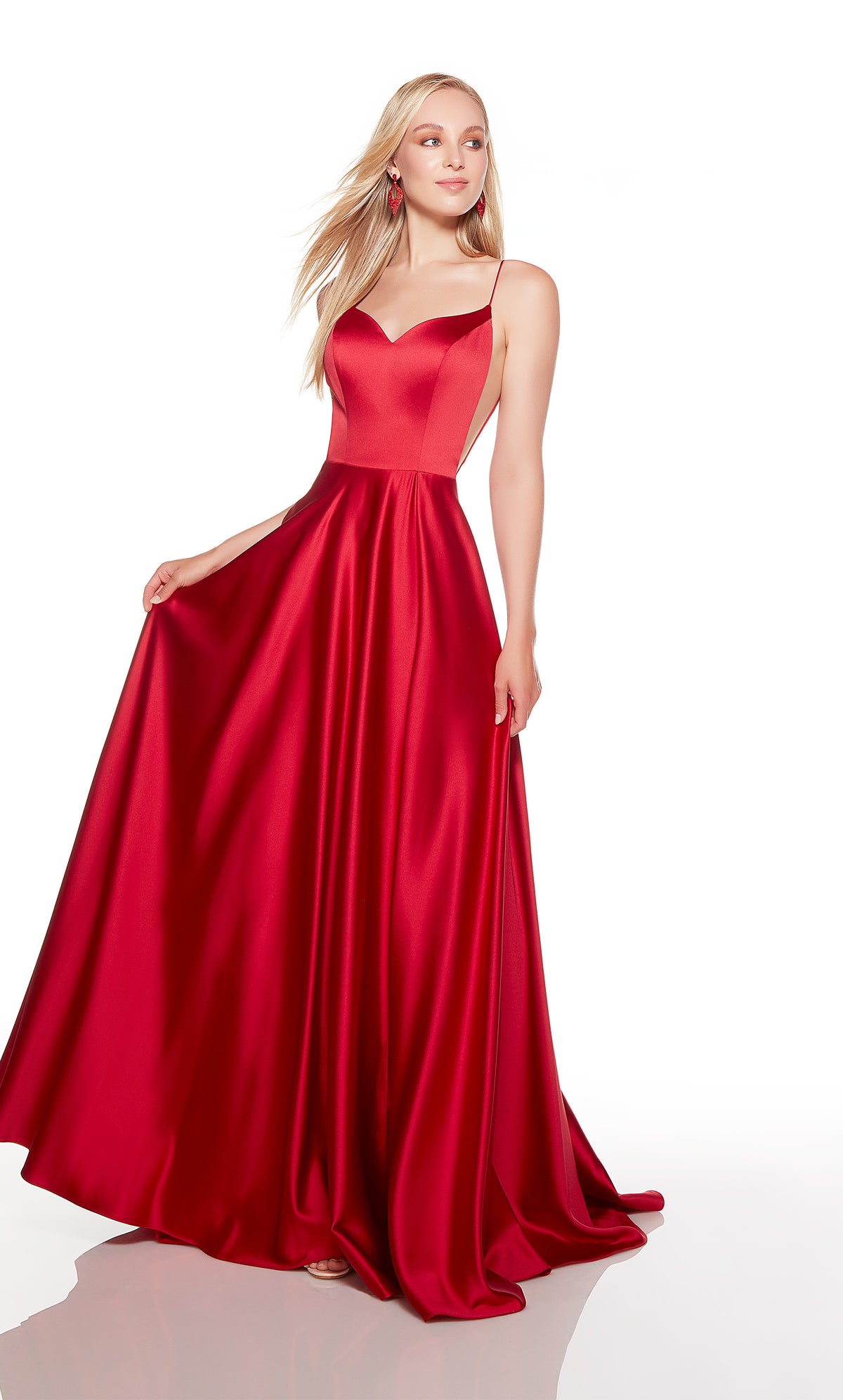 Red formal dress with a sweetheart neckline and high slit.