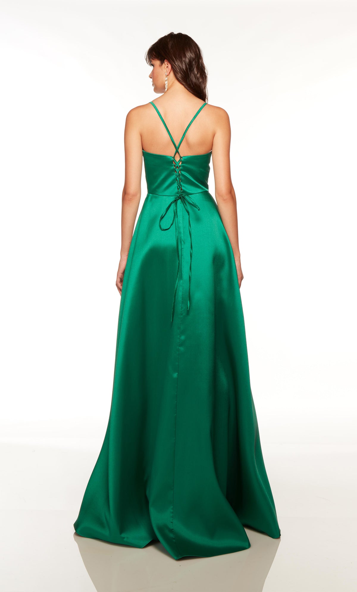 Green prom dress with a lace-up back style and slight train.