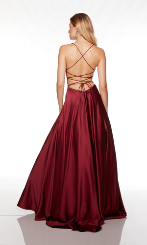 Dark red satin dress with a strappy, lace-up back and train.