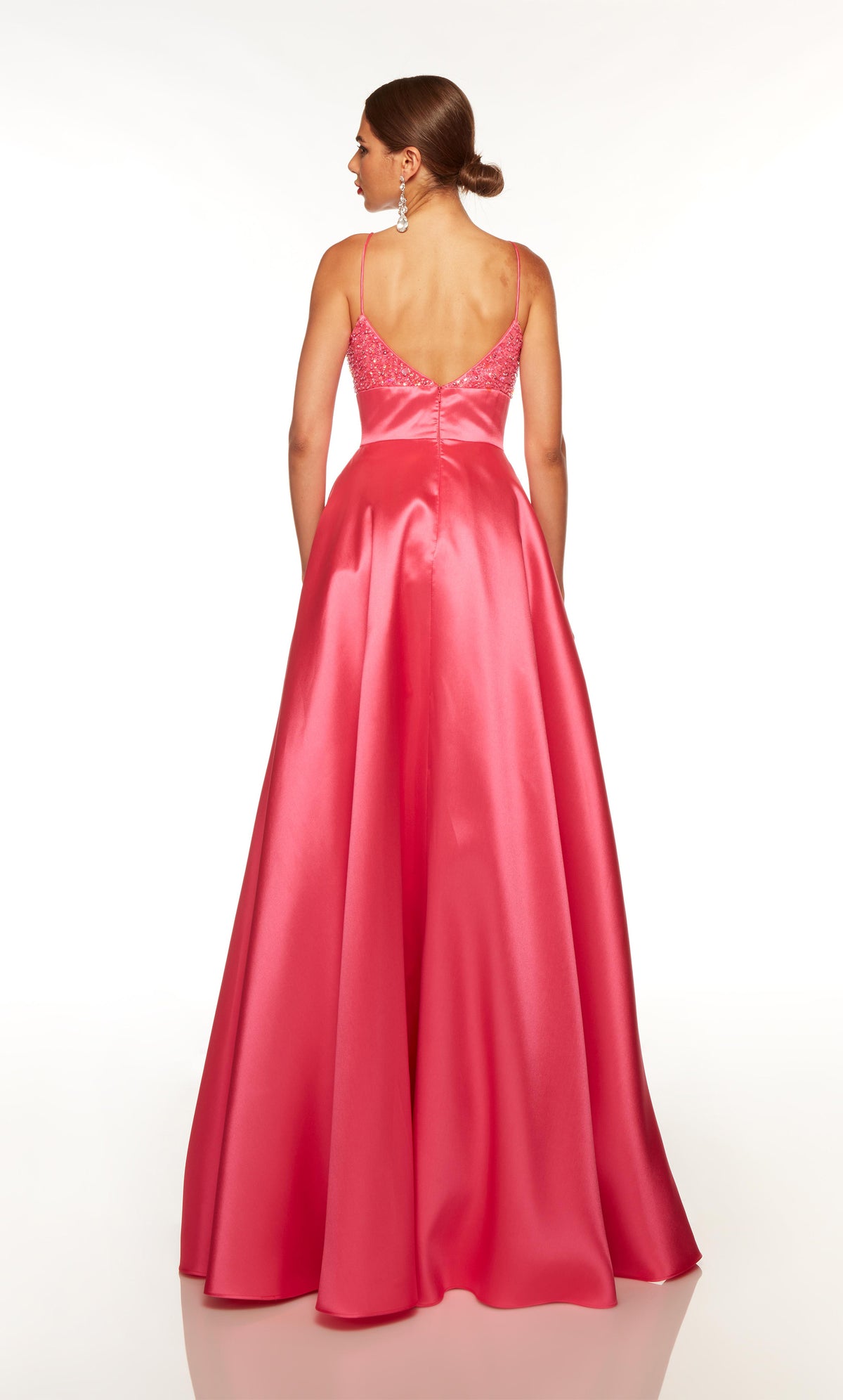 Floor length, hot pink formal dress with a V shaped back.
