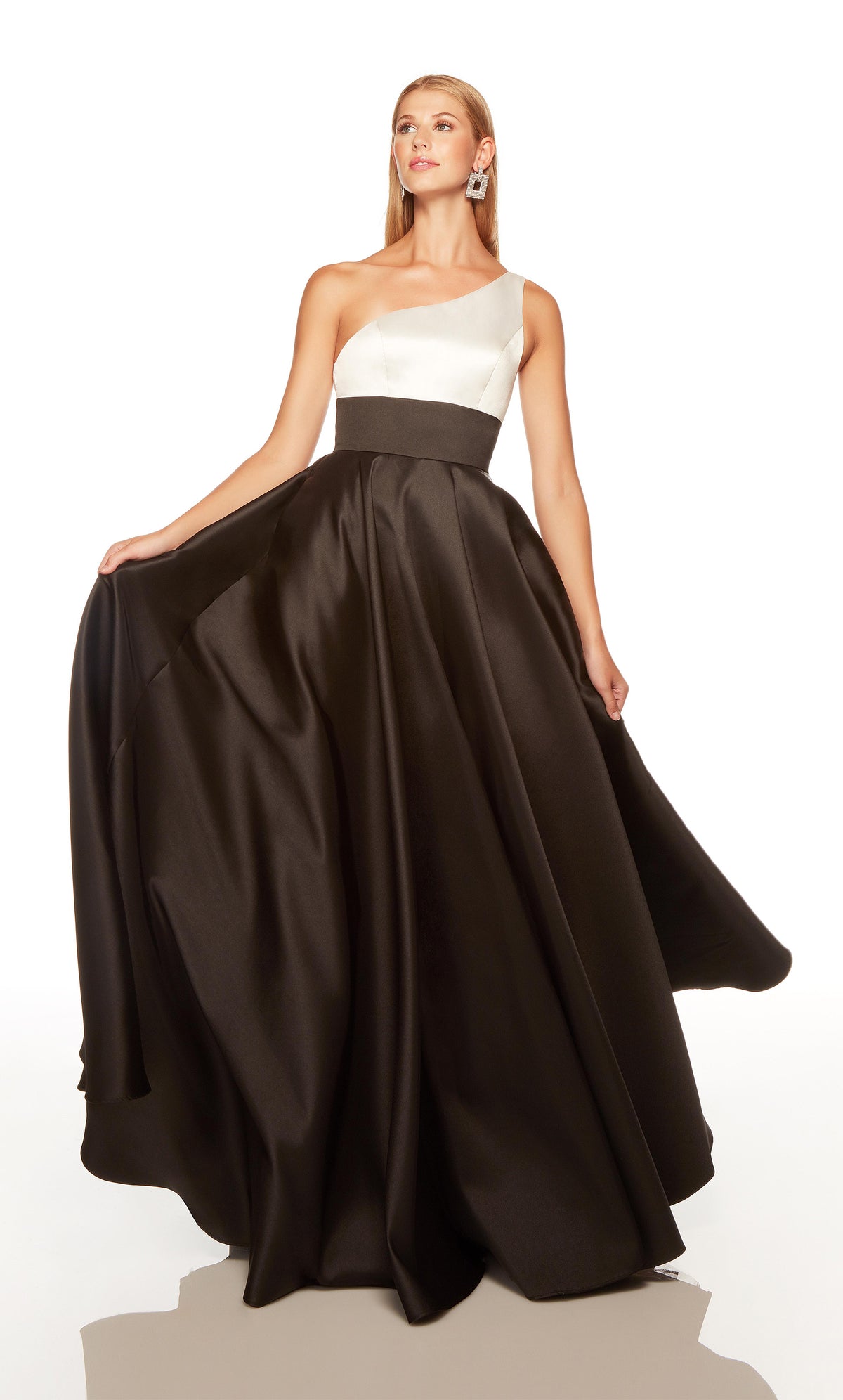 Black and white elegant gown with a one shoulder neckline, and pockets.