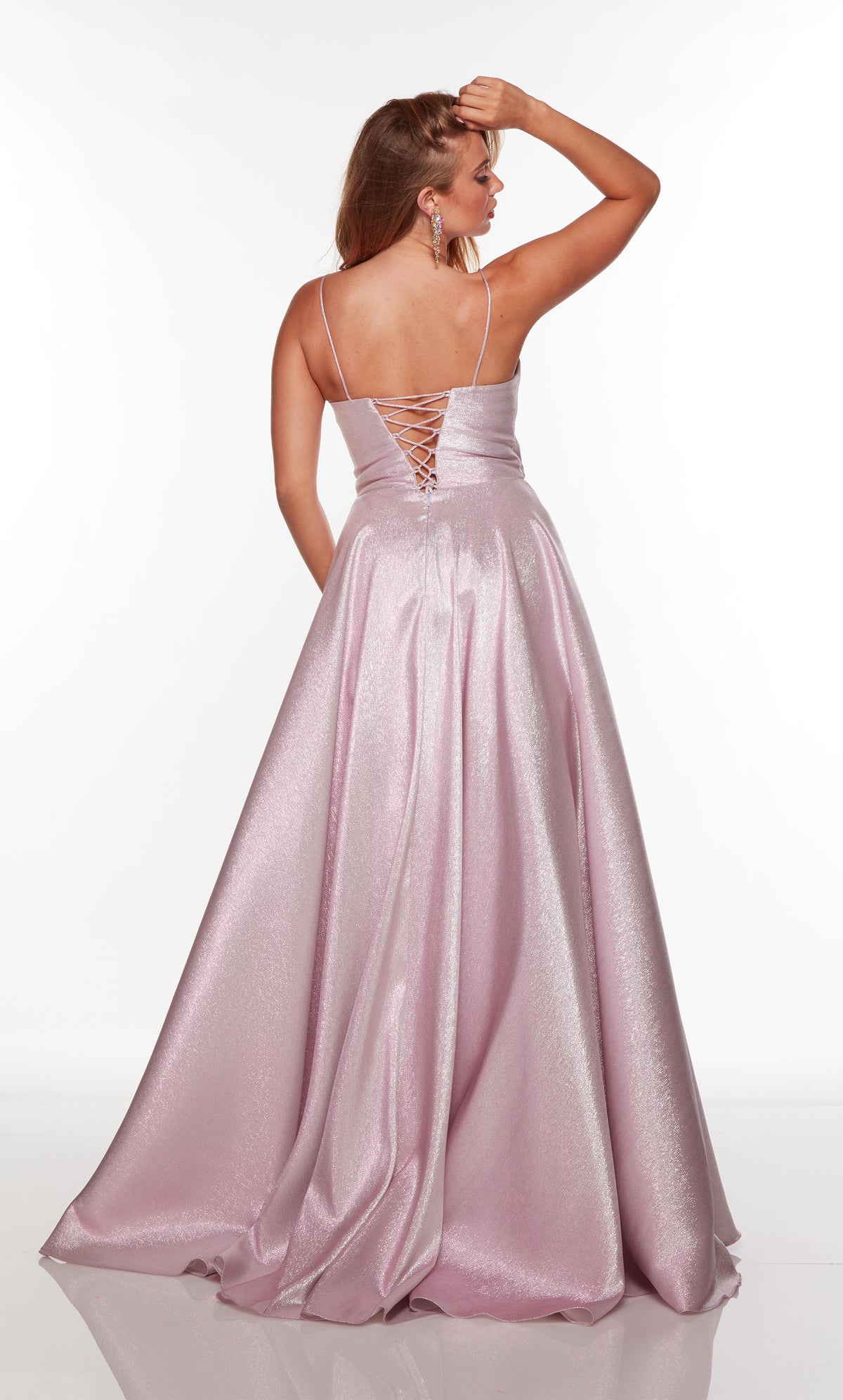 Light purple prom dress with a sweetheart neckline, ruched bodice, and pockets.
