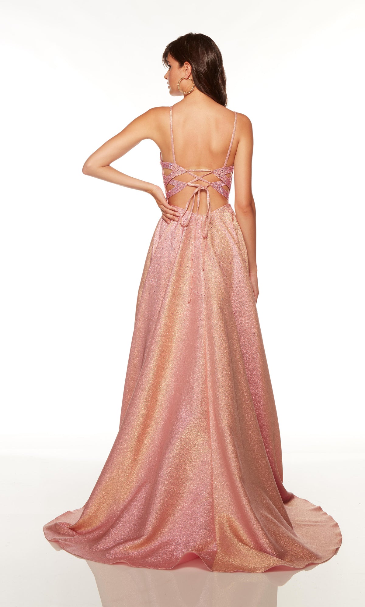 Pink-gold iridescent prom dress with a lace up back and train.