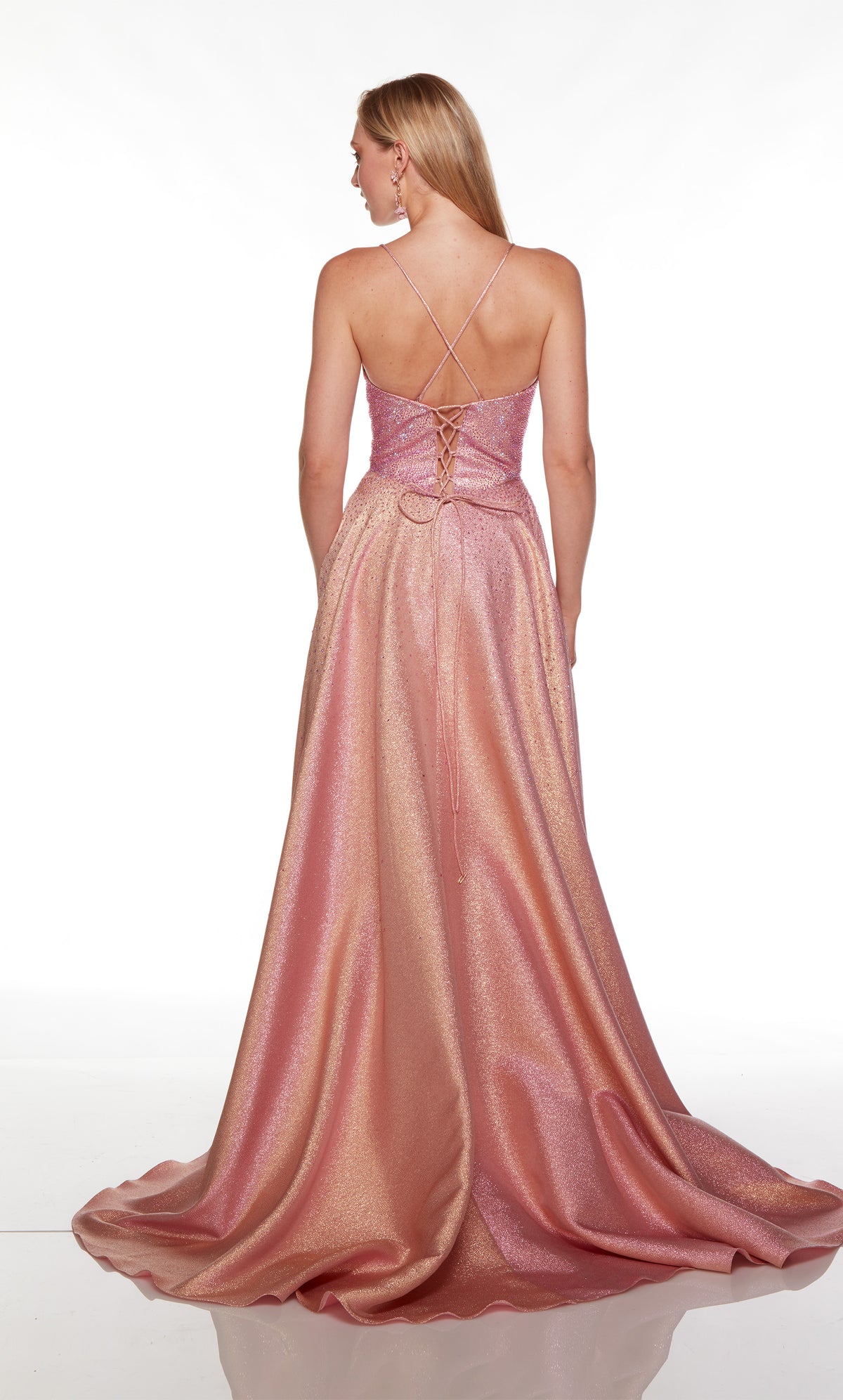 Criss-cross back gown with train in iridescent pink-gold.