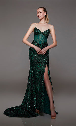 Captivating green strapless prom dress with intricate sequin detailing, corset bodice, alluring slit, and an graceful train for an red-carpet-worthy look.