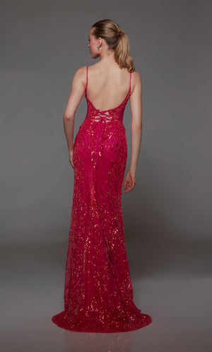 Barbie pink sequin formal gown: plunging neckline, front slit, lace-up back, slight train. A stunning choice for an elegant and glamorous occasion.