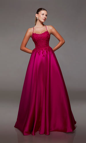 Pink mikado ball gown with lace corset, strappy back, and slight train for an stylish and vibrant look.