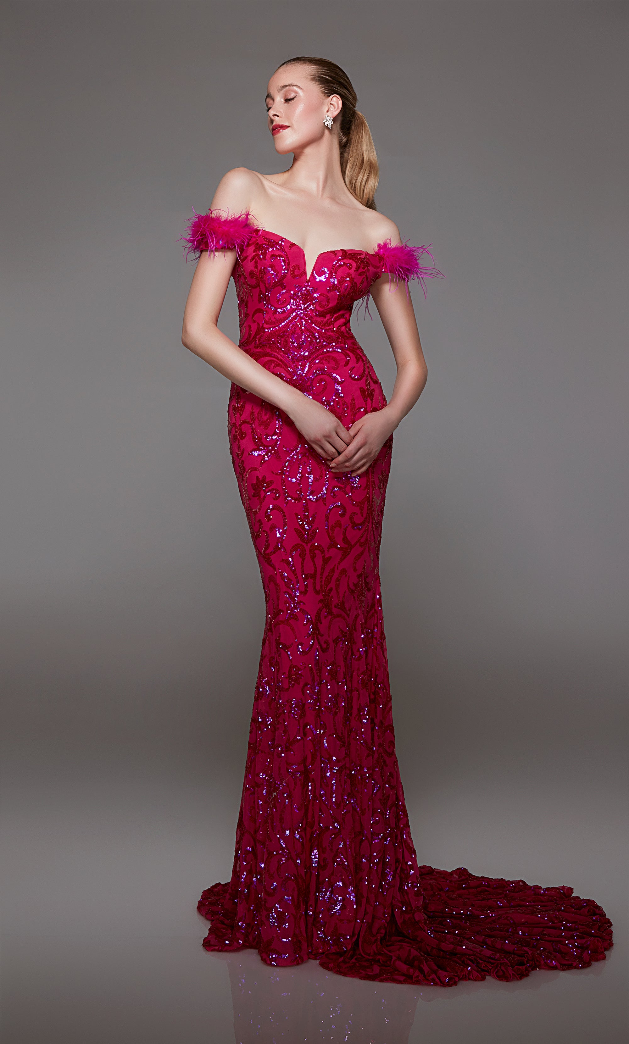 Pink off-shoulder designer dress: sequin embellishments, feather trim, lace-up back, and an glamorous train for elegant allure.
