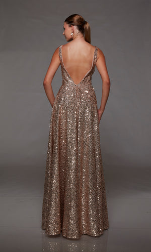 Rose Gold prom dress: A-line silhouette, plunging neckline, front slit, and an chic V-shaped back for an stylish and glam look. Designed by ALYCE Paris.