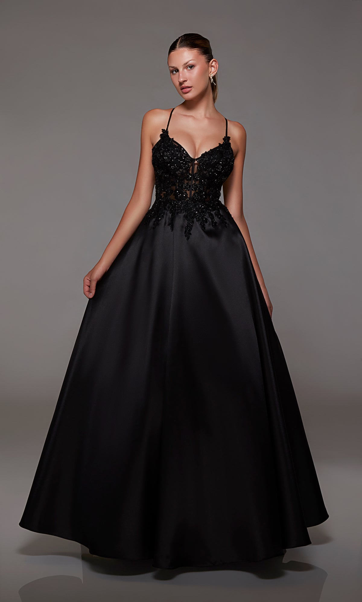 Black corset ball gown: V-neckline, sheer floral lace bodice, full mikado skirt, lace-up back for an captivating and timeless look.