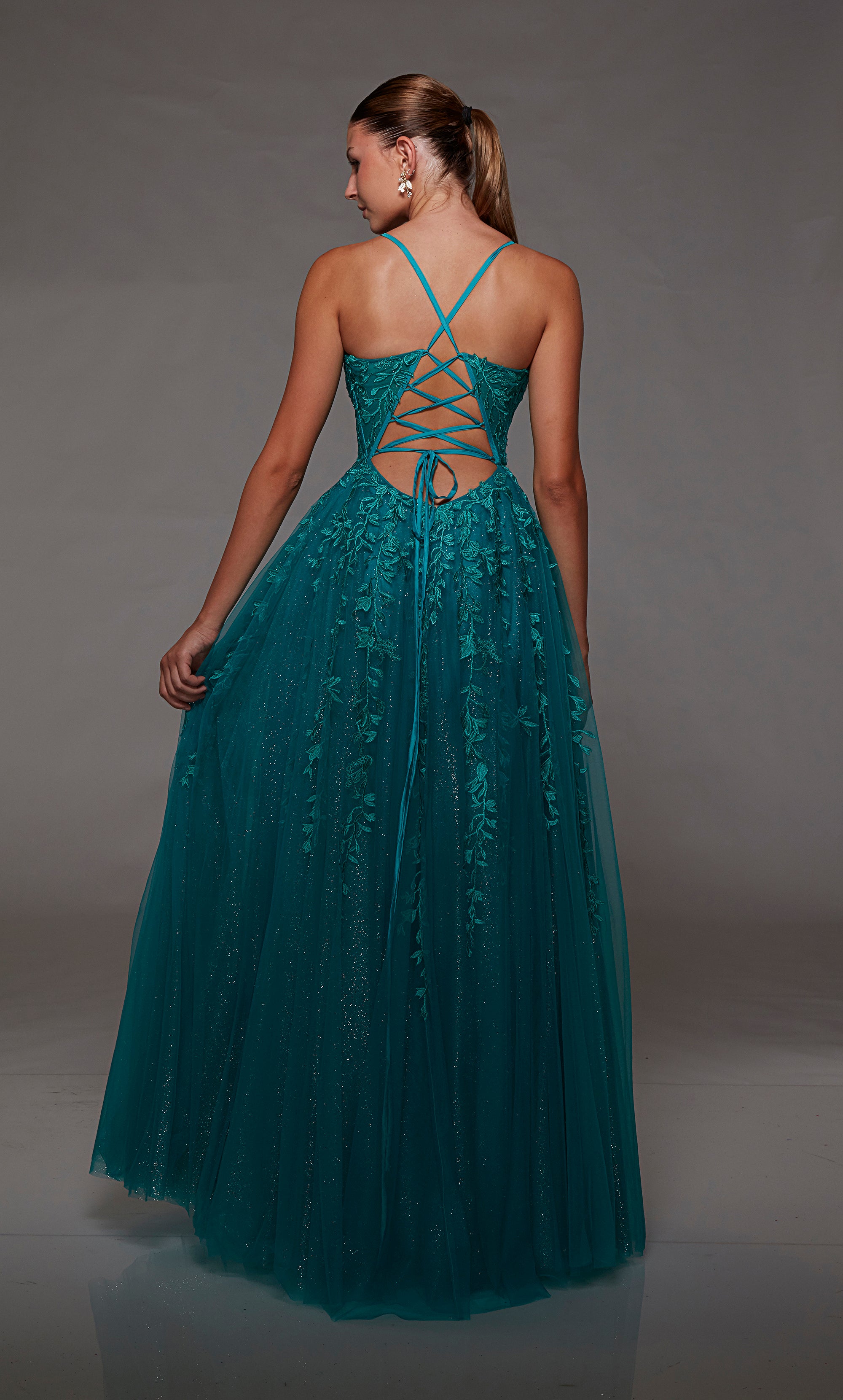 Lapis blue square neck ball gown prom dress: Glitter tulle, corset bodice, adorned with floral lace appliques, and an captivating strappy lace-up back.