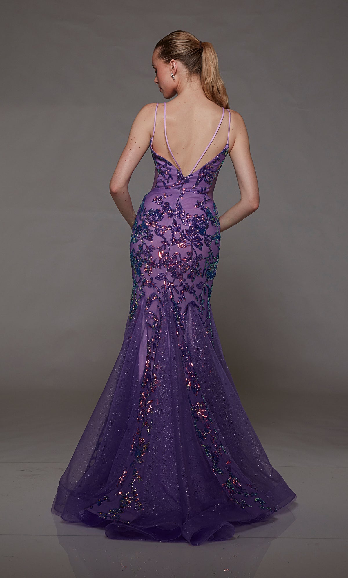 Purple-pink mermaid dress: Plunging neckline, sequin flowers, sheer side cutouts, and dual straps for an stunning and sophisticated look.