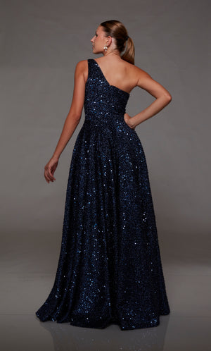 Elegant navy blue one-shoulder gown: High slit, zip-up back, and an slight train in sparkly iridescent sequin fabrication for an glamorous and sophisticated look.