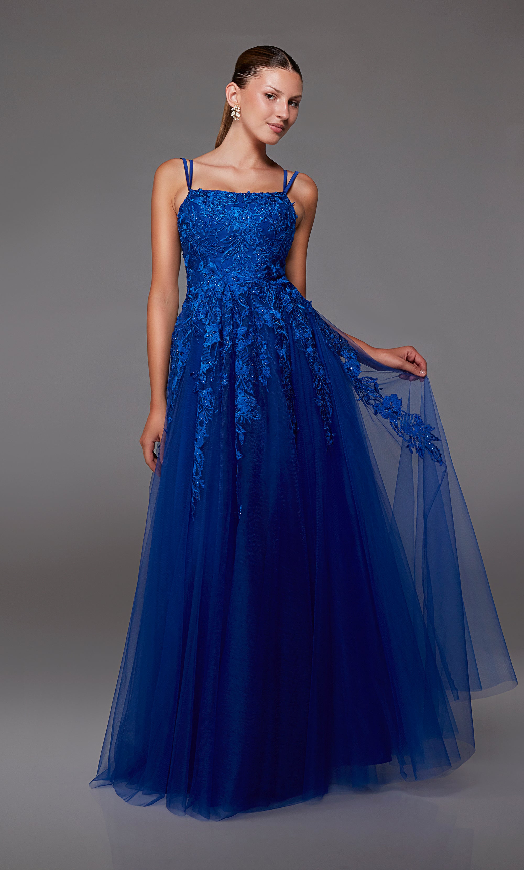 A-line silhouette, royal blue prom dress with an square neckline, dual straps, zip-up back, and delicate lace appliques for an touch of elegance.