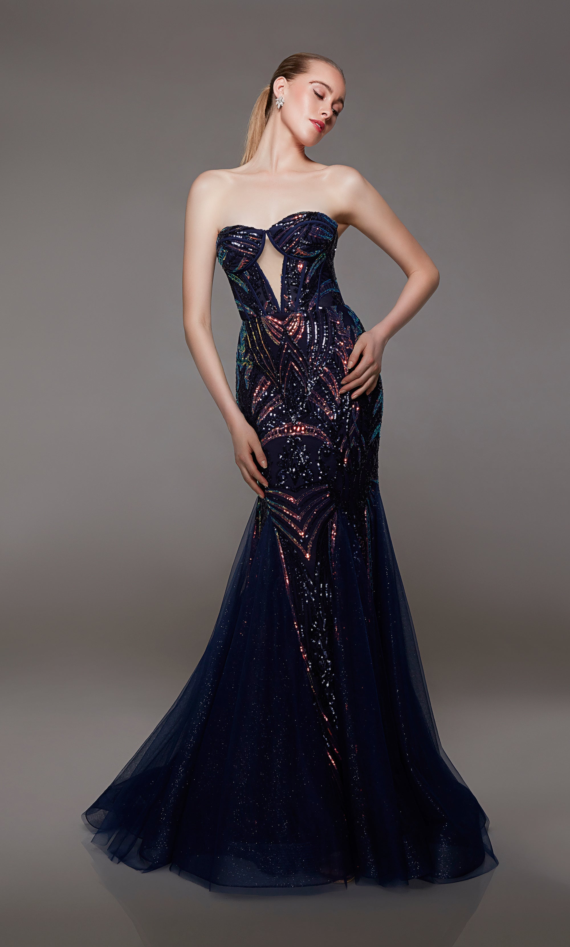 Navy blue mermaid dress: Strapless neckline, keyhole cutout, playful iridescent sequin detail. Back features an lace-up closure for the perfect fit.