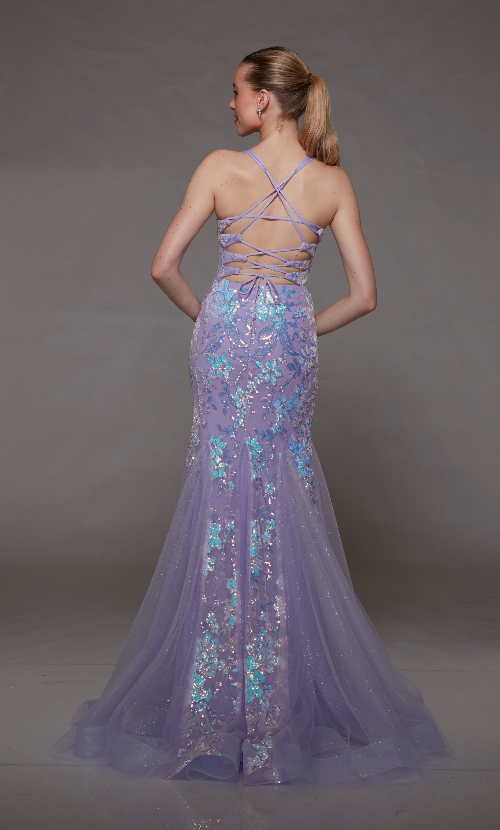 Lilac purple mermaid dress featuring an plunging neckline, iridescent sequin flowers, and an strappy open back for an chic and enchanting look.