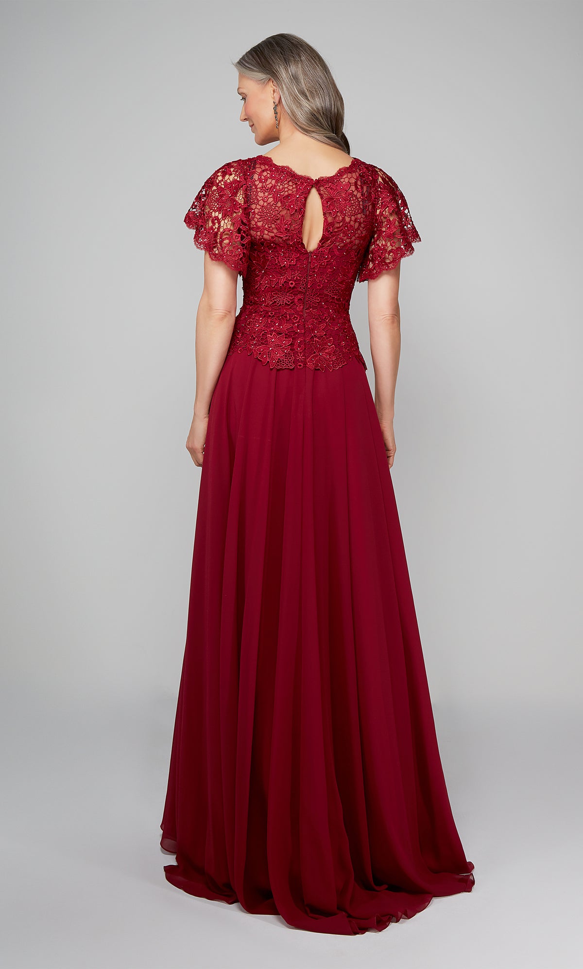 Long formal dress with lace peplum top with butterfly sleeves, a keyhole back, and an flowy chiffon skirt in wine red.