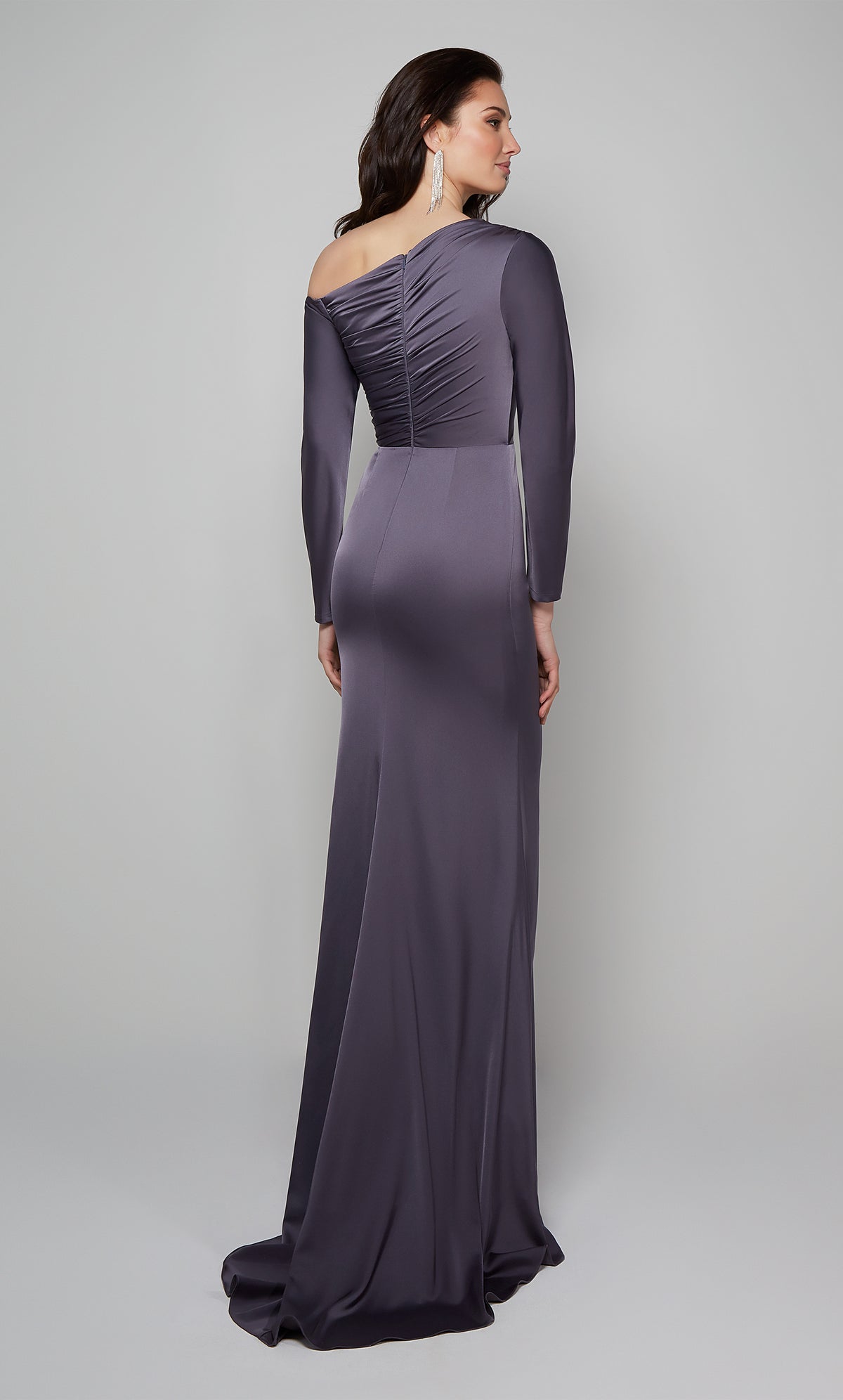 Ruched special occasion dress with a closed back, long sleeves, and a train in graphite.