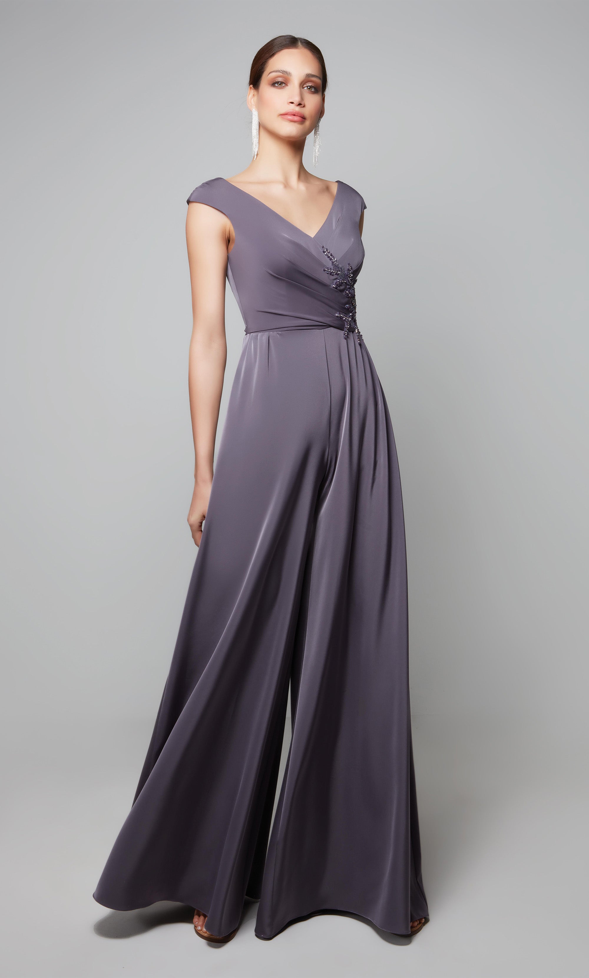 Elegant wide leg jumpsuit with cap sleeves and lace applique at the waist in graphite. Color-SWATCH_27559__GRAPHITE