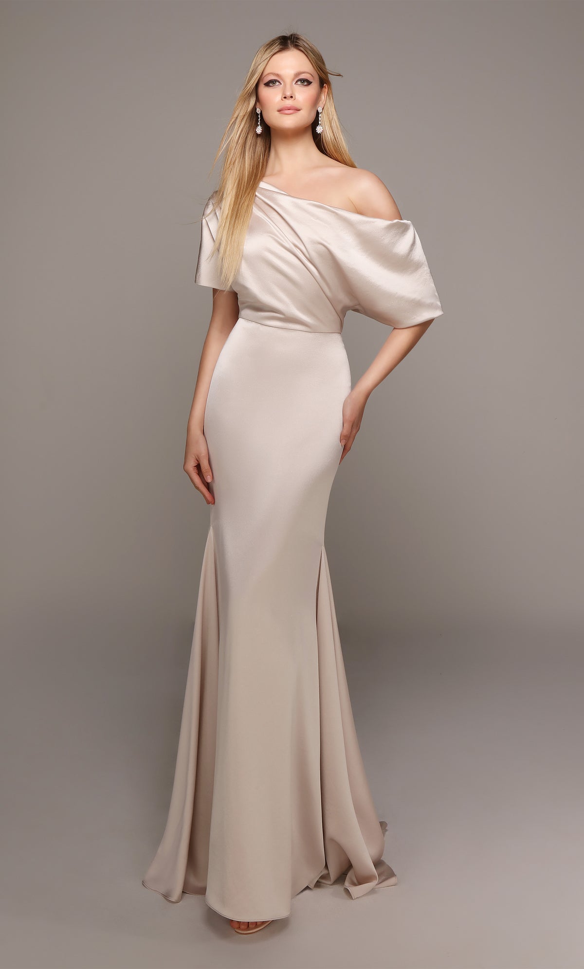 Mother of the bride drape dress in creme color.