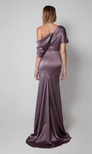 Purple one shoulder drape dress with a closed back and train.
