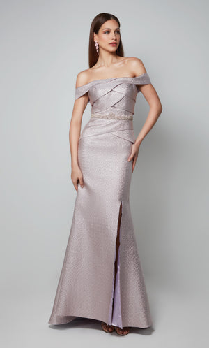 Light pink metallic off the shoulder special occasion dress with a beaded waist and side slit.