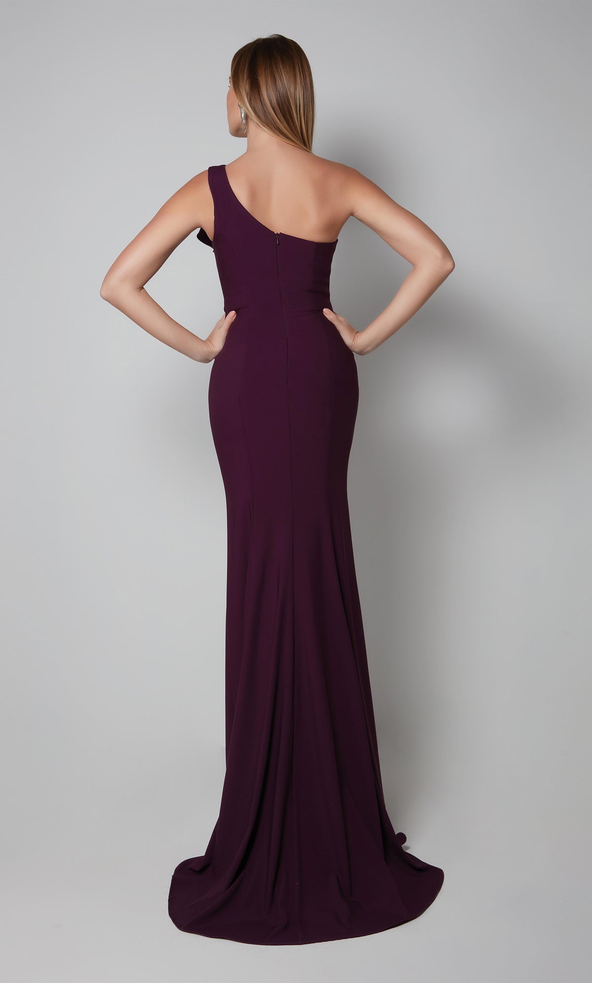 Long one shoulder evening gown with a zip up back and train in purple.