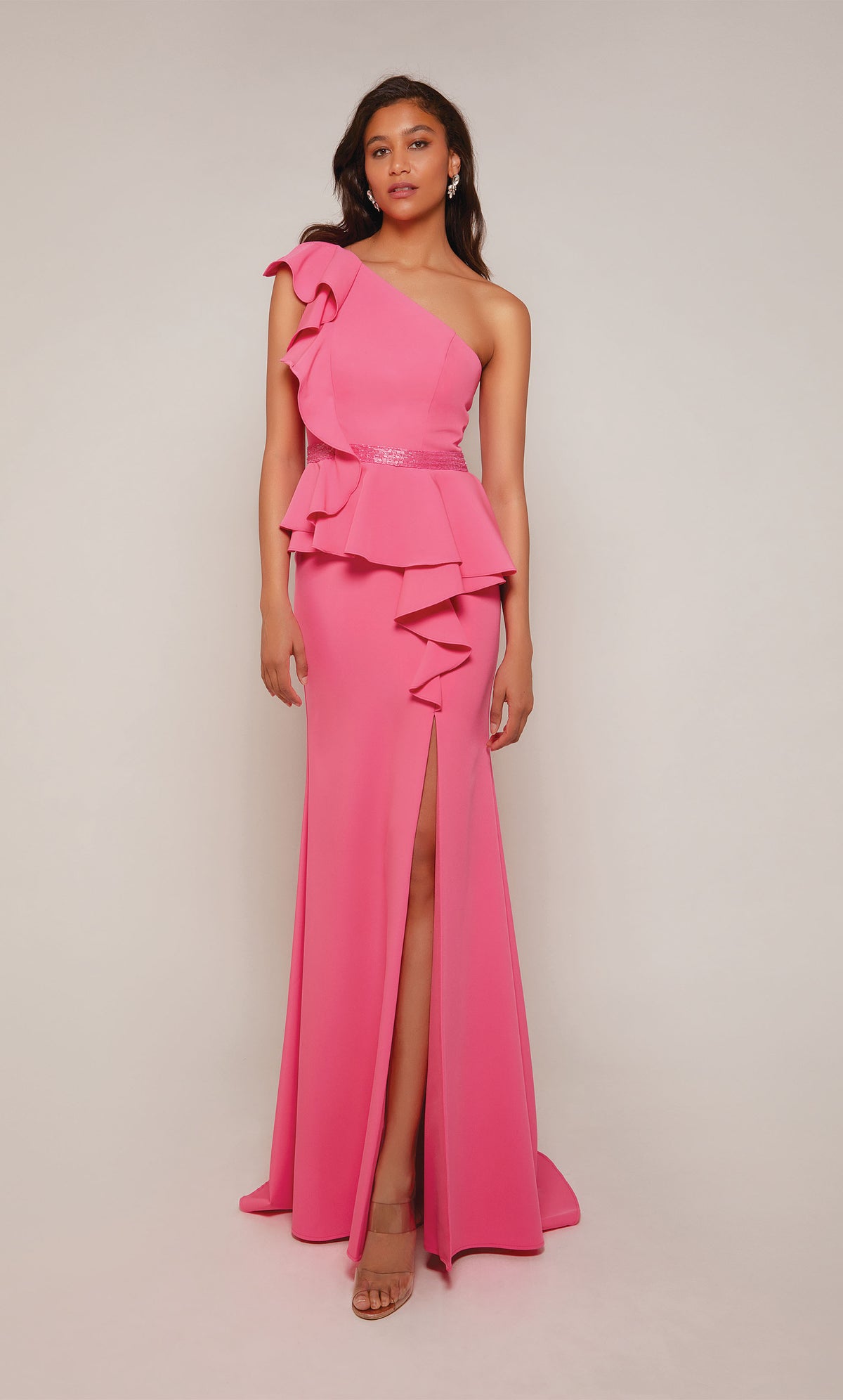 Bubblegum pink. one shoulder peplum dress with ruffle detail, faux beaded belt, and side slit.