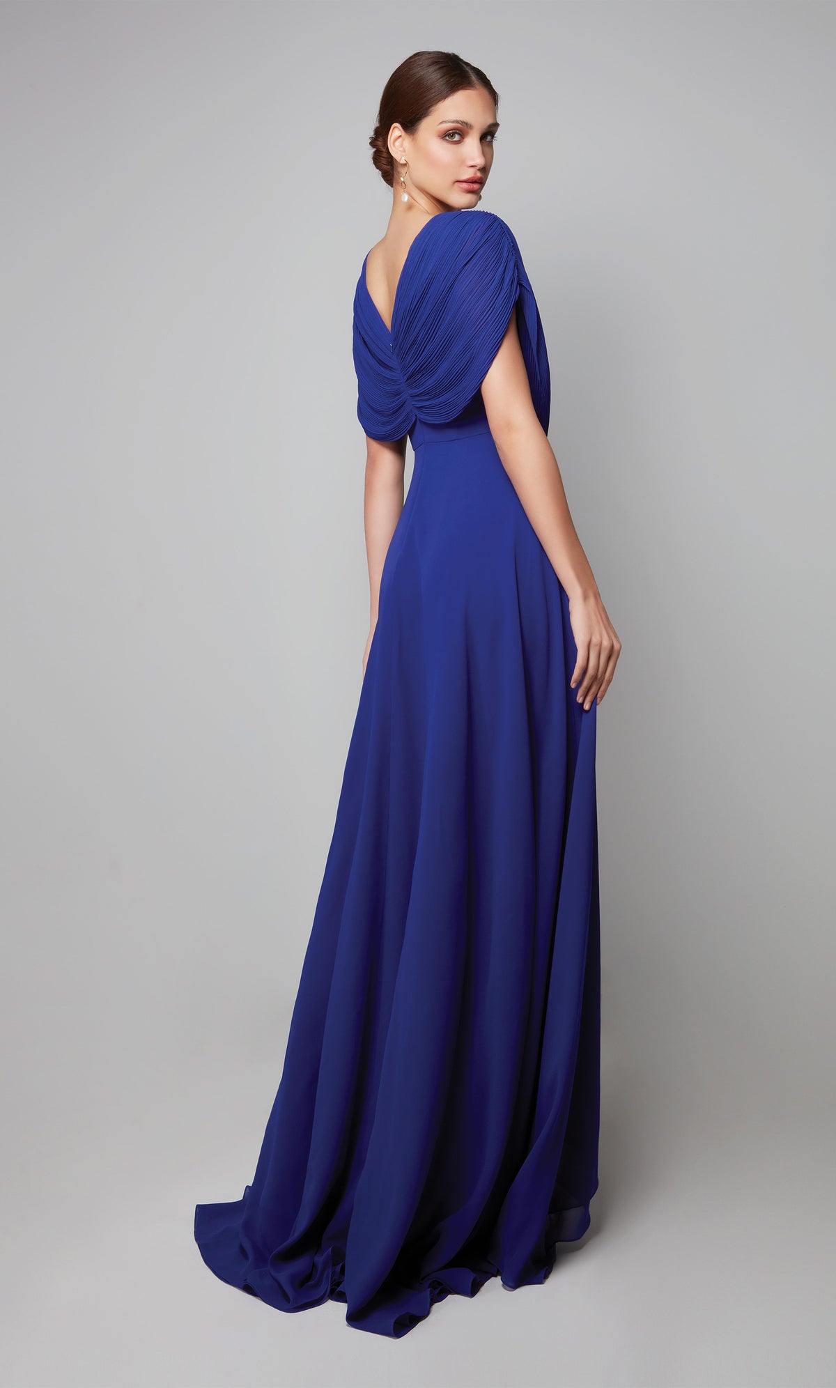Flowy chiffon gown with a draped top, closed back, and train in cobalt blue.